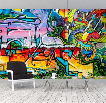 Bild på graffitis aux couleurs vives sur murs et gouttires